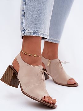 Heel sandals Step in style  Women\'s leather sandals are a stylish proposition for women who appreciate elegance and comfort. The model set on a column heel subtly emph
