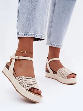 Buskin Step in style  Women\'s wedge sandals from the Wrangler brand are a stylish and comfortable option for warm days. Their universal design complements both e