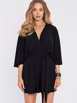 Suit Moe  An elegant women\'s jumpsuit made of lightweight fabric with a distinct texture (crepe) and a matte finish is a proposal that combines moder