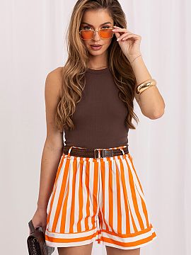 Shorts Italy Moda  Stylish women\'s material shorts are the perfect choice for everyday wear, especially on warmer days. They stand out with a fashionable stri