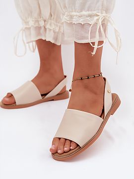 Sandals Step in style  Women\'s sandals made of eco leather are an elegant choice for warm days. Set on a flat heel, they provide comfort and convenience throughou