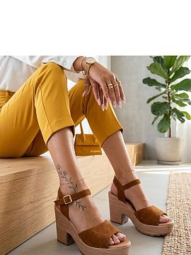 Heel sandals Solea  Elegant and striking sandals on a massive heel are a proposal for women who like a combination of fashionable design, comfort, and feminine 