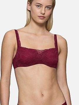Braceless bra Triumph  The balconette bra Body Make-Up Illusion Lace 10219845-00EW in fashionable pistachio shade is a combination of modern elegance, perfect supp