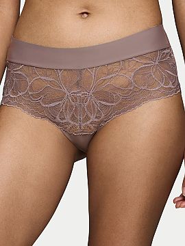 Panties Triumph  Figi Body Make-Up Illusion Lace 10219748-3091 in a trendy pistachio shade is a unique proposal that subtly emphasizes feminine curves, provi
