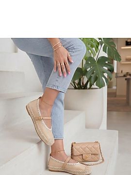 Espadrille Solea  Buckle-fastened espadrilles are a stylish proposition for summer days, combining comfort with a feminine, timeless design. Their classic sty