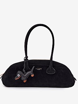 Everyday handbag Step in style  Stylish baguette bag made of eco-suede is a fashionable accessory that fits perfectly with current trends. The model is fastened with a zipp