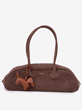Everyday handbag Step in style  A stylish baguette bag made of eco-suede is a fashionable accessory that fits perfectly with current trends. The model is fastened with a zi