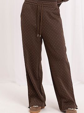 Tracksuit trousers Italy Moda  Women\'s wide leg sweatpants are an eye-catching proposition that combines the comfort of a sporty cut with a fashionable, bold finish. The 