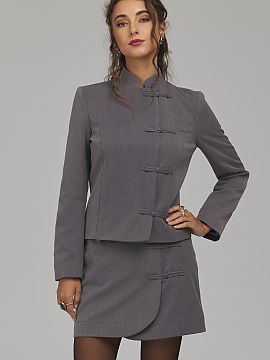 Short skirt Nife  A women\'s skirt with a regular cut is a stylish proposal that combines a classic form with original details. The slightly flared cut toward