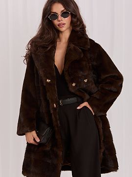 Coat Factory Price  Fur women\'s coat in an elegant style is a spectacular proposal for the autumn-winter season. The model is made of a material that is a comb
