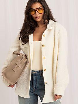 Jacket Rue Paris  Women\'s boucle knit jacket is a stylish proposal for the transitional season, perfect for everyday casual styling. Made of material with a 