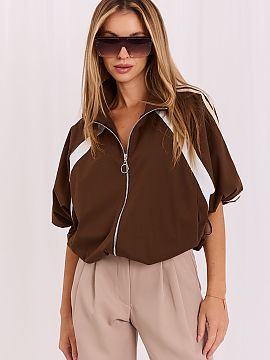 Jacket Italy Moda  Lightweight women\'s windbreaker jacket, perfect for spring and summer days. The model is kept in a sporty-casual style, made of predominate