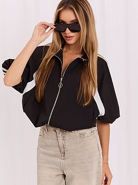 Jacket Italy Moda  Light women\'s jacket, a type of windbreaker, perfect for spring and summer days. The model is in a sporty-casual style, made of dominant co