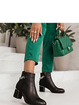 Heel boots Solea  Elegant women\'s ankle boots made of eco-leather, maintained in a classic style. The model has a round toe and a stable 6 cm heel, providing