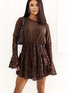 Suit Italy Moda  Stylish women\'s jumpsuit inspired by the design of a flared dress is an original proposal for everyday wear and for a party. The mini-lengt
