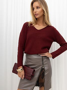 Short skirt Rue Paris  A leather mini skirt made of eco-leather is a combination of elegance and modern style. Made of a high-quality blend of polyester and polyur