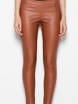 Women trousers Venaton  Elegant trousers made of fabric imitating leather. A model with narrow legs and a higher state. Smooth front, with a zip at the side.
