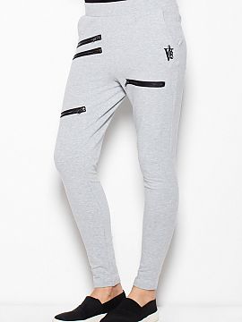 Tracksuit trousers Venaton  Tapered sweatpants with a low crotch and pockets. Decorative zippers on each leg. Trousers are a base for many stylings.