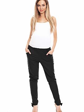 Maternity pants PeeKaBoo  Maternity sweatpants with a loose fit. Legs decorated with bows.
 Composition:  .
 Leggings: 95% Cotton, 5% Elastane .