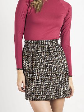 Skirt IVON  Mini skirt made of glamorous fabric. A decorative zipper at the back of the skirt making it look elegant. Slightly flared cut thanks to deco