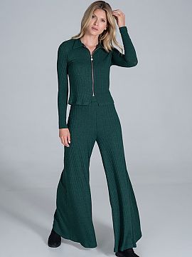 Trousers Figl  Bell-bottomed trousers of flowing, ribbed knit, with a wide rubber band at the waist, without pockets.