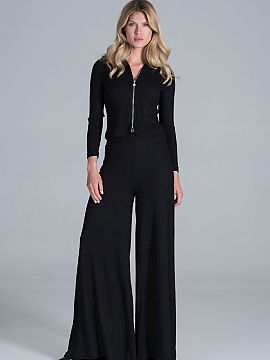 Trousers Figl  Bell-bottomed trousers of flowing, ribbed knit, with a wide rubber band at the waist, without pockets.