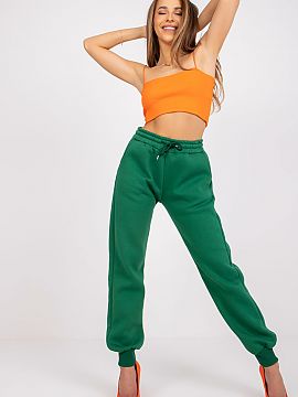 Tracksuit trousers Ex Moda  Women\'s sweatpants with elastic band and binding at the waist. Slip-on pockets on the sides.