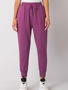Tracksuit trousers Fancy  Sweatpants with elastic band and waist tie. Slip-on pockets on the sides, leg ends with welts.