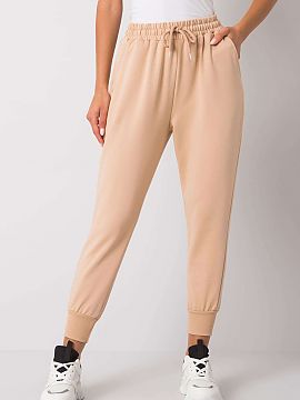 Tracksuit trousers   Fancy  Sweatpants with elastic band and waist tie. Slip-on pockets on the sides, leg ends with welts.