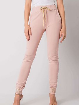 Tracksuit trousers Relevance  High rise sweatpants with a tie at the waist. Slip-on pockets on the sides. Decorated with rhinestones at the cuffs.
