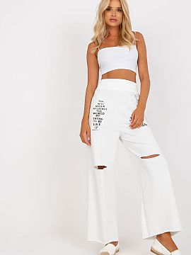 Women trousers Fancy  Sweatpants with wide legs, slip pockets on the sides, elastic waistband, decorative slits and lettering on the front. Comes with a detachabl