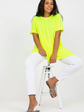 Plus size Tunic Relevance  Plus size tunic with short sleeves and a boat neckline. Bottom of the tunic asymmetrical. A perfect choice for many stylings.