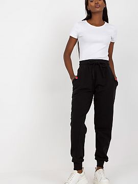 Tracksuit trousers BFG  Sweatpants with elastic waistband, slip pockets on the sides. High-waisted pants with a tie at the waist.