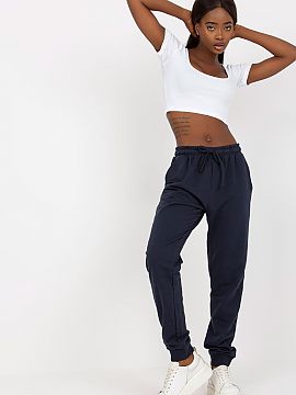 Tracksuit trousers BFG  Sweatpants with elastic waistband, slip pockets on the sides. High-waisted pants with a tie at the waist.