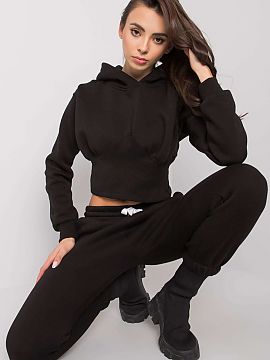 Set Ex Moda  Women\'s sweatshirt set consisting of a sweatshirt and pants. Short sweatshirt with long sleeves and a hood. Long pants with a tie at the wa