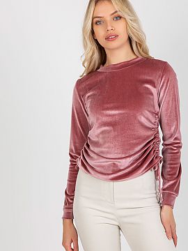 Blouse Lakerta  Short velour blouse with long sleeves and a round neckline. On the sides there are ties to adjust the length.