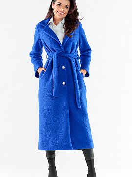 Coat awama  Coat made of pleasant, warm fabric with a maxi length. The straight cut of the coat and sleeves optically slenderize the silhouette. Fastene