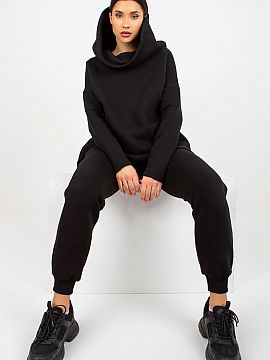 Set Ex Moda  Women\'s set consisting of a sweatshirt and pants. Sweatshirt of an extended cut with long sleeves and a hood. Long pants with waist tie and