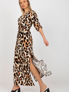 Daydress Lakerta  Long dress with 3/4 sleeves and a heart neckline. Free slits at the bottom, complete with a tie belt.