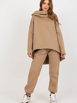 Set Ex Moda  Women\'s set consisting of a sweatshirt and pants. Sweatshirt of an extended cut with long sleeves and a hood. Long pants with waist tie and