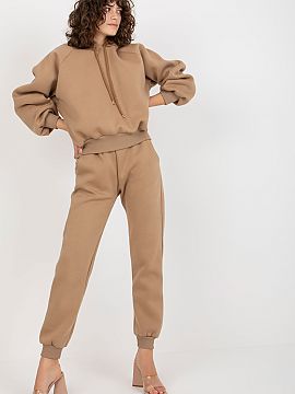 Set Ex Moda   A sweatshirt set consisting of a sweatshirt and pants. Sweatshirt with long sleeves and a hood. Long pants with waist tie and slip pockets.