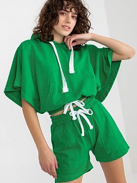 Set Ex Moda  Tracksuit set consisting of a blouse and shorts. Blouse with short wide sleeves, hood and kangaroo pocket. Shorts with waist tie and slip po