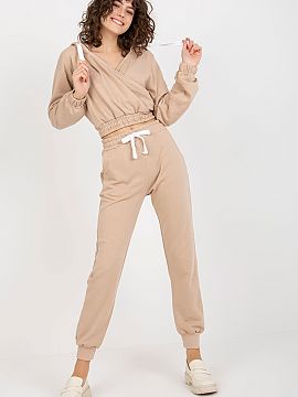 Set Ex Moda  A sweatshirt set consisting of a sweatshirt and pants. Short sweatshirt with long sleeves, hood and envelope neckline. Long pants with waist