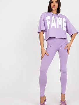 Set Ex Moda  A sweatshirt set consisting of a sweatshirt and leggings. Sweatshirt of a loose cut with short sleeves and a hood. Long leggings with wide e