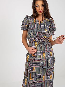 Daydress Lakerta  Dress with short sleeves and neckline with decorative slit. Sleeves in the form of buffets, with a tie at the waist.