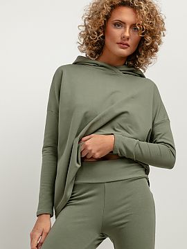 Sweatshirt Tessita  A loose sweatshirt made of soft knit fabric and an extended back will be great for sporty styling. The hood and the seam at the back add uni