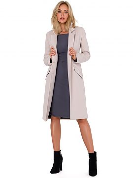 Coat Moe  Women\'s fleece coat of classic cut with a padded collar. The coat is fastened with two buttons, with long sleeves. The coat is fully lined,