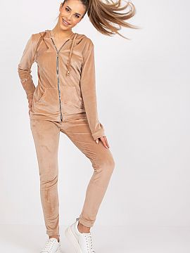 Set Relevance  Velour set consisting of a sweatshirt and long pants. Sweatshirt with long sleeves and a hood, zippered. On the front there are slip pockets