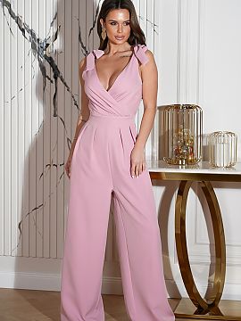 Suit Bicotone  Elegant jumpsuit sewn from airy fabric. The neckline can be adjusted thanks to the ties on the shoulders .  The model with a perfectly tailo