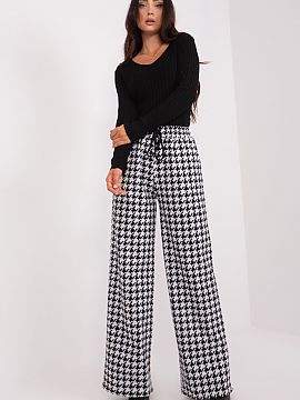 Women trousers Lakerta  Casual style high-waisted fabric pants with waist tie and slip pockets. Pants with wide legs made of material in gray-black color. A proposi